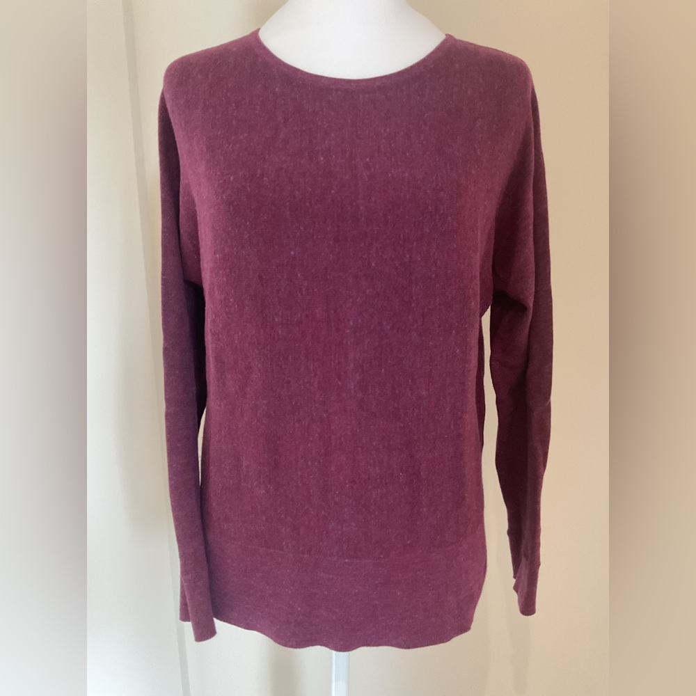 2/$30  Banana republic sweater with side slits. Colour described as Burgundy